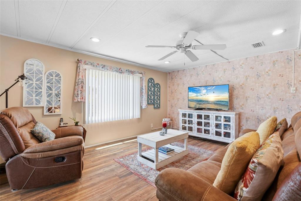970 Jolanda Circle Venice, FL 34285 - Photo 5 of 34 a living room with furniture and a flat screen tv