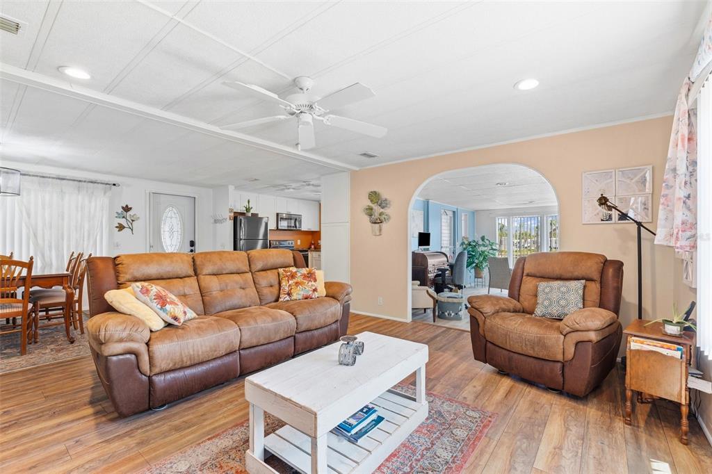 970 Jolanda Circle Venice, FL 34285 - Photo 6 of 34 a living room with furniture and a wooden floor
