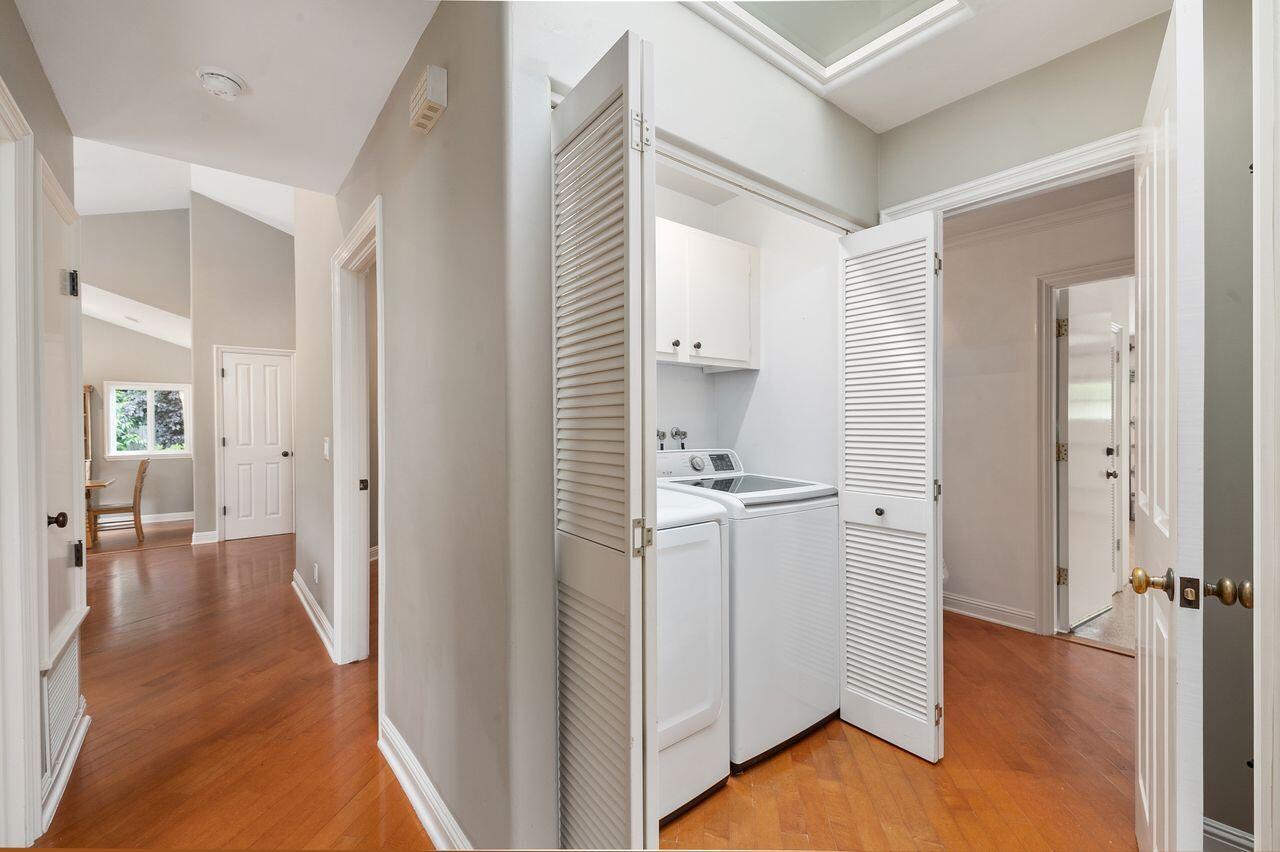 5118 Concord Place Carpinteria, CA 93013 - Photo 14 of 25 a view of a kitchen from the hallway with a wooden floor