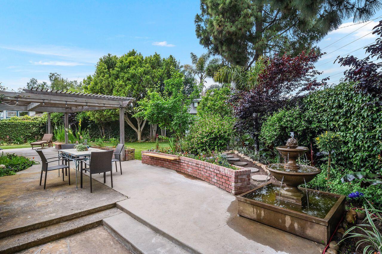 5118 Concord Place Carpinteria, CA 93013 - Photo 20 of 25 a view of a patio with couches table and chairs and potted plants