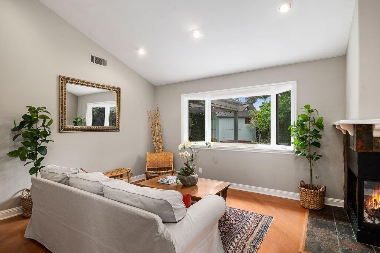5118 Concord Place Carpinteria, CA 93013 - Photo 4 of 25 a living room with furniture and a potted plant