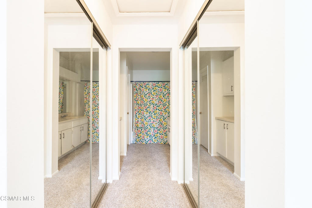 4240 Lost Hills Road, Unit 3302 Calabasas, CA 91301 - Photo 14 of 27 a view of a hallway with wooden floor