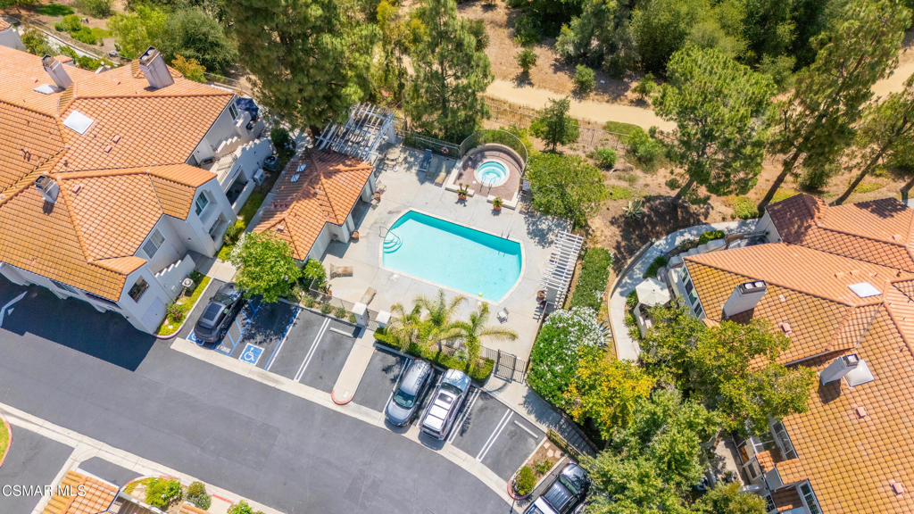 4240 Lost Hills Road, Unit 3302 Calabasas, CA 91301 - Photo 25 of 27 an aerial view of a house with a yard and garden