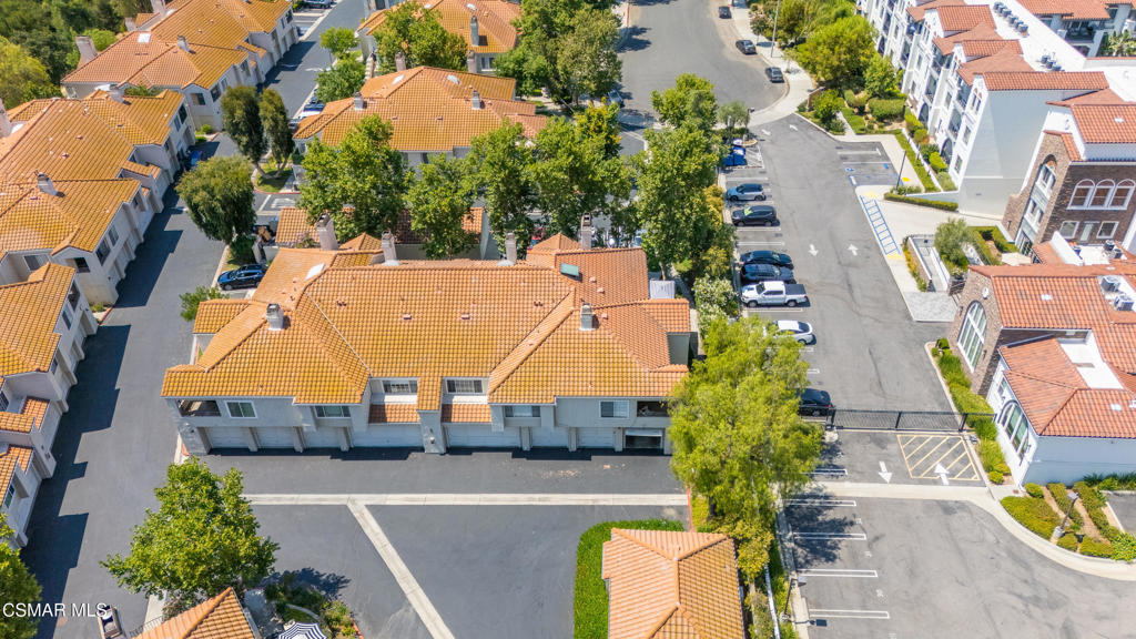 4240 Lost Hills Road, Unit 3302 Calabasas, CA 91301 - Photo 26 of 27 an aerial view of a house with a yard and a large pool