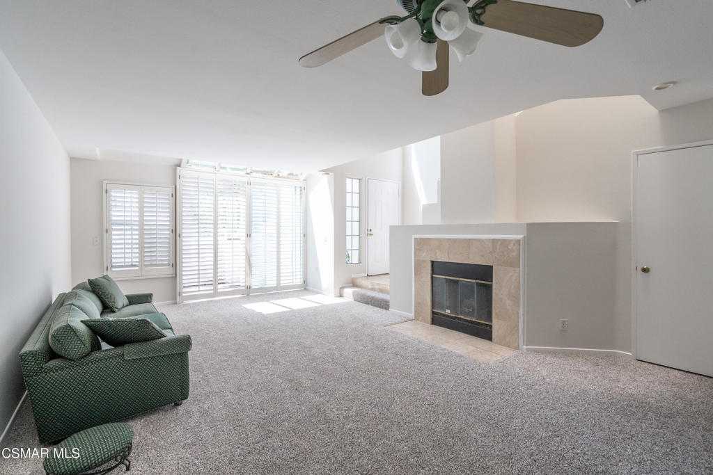 4240 Lost Hills Road, Unit 3302 Calabasas, CA 91301 - Photo 4 of 27 a living room with furniture and a fireplace