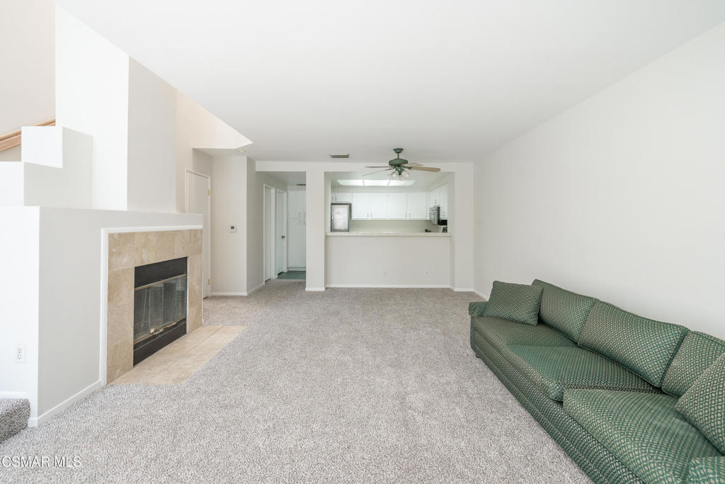 4240 Lost Hills Road, Unit 3302 Calabasas, CA 91301 - Photo 9 of 27 a living room with furniture and a fireplace