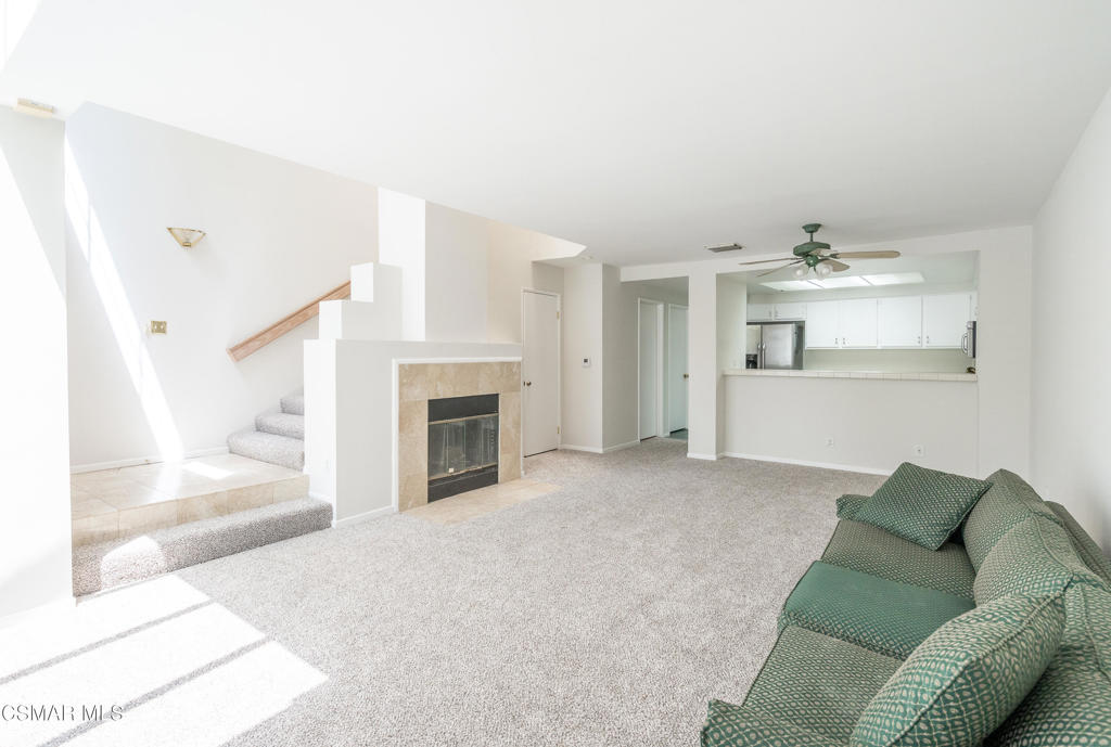 4240 Lost Hills Road, Unit 3302 Calabasas, CA 91301 - Photo 10 of 27 a living room with furniture and a fireplace
