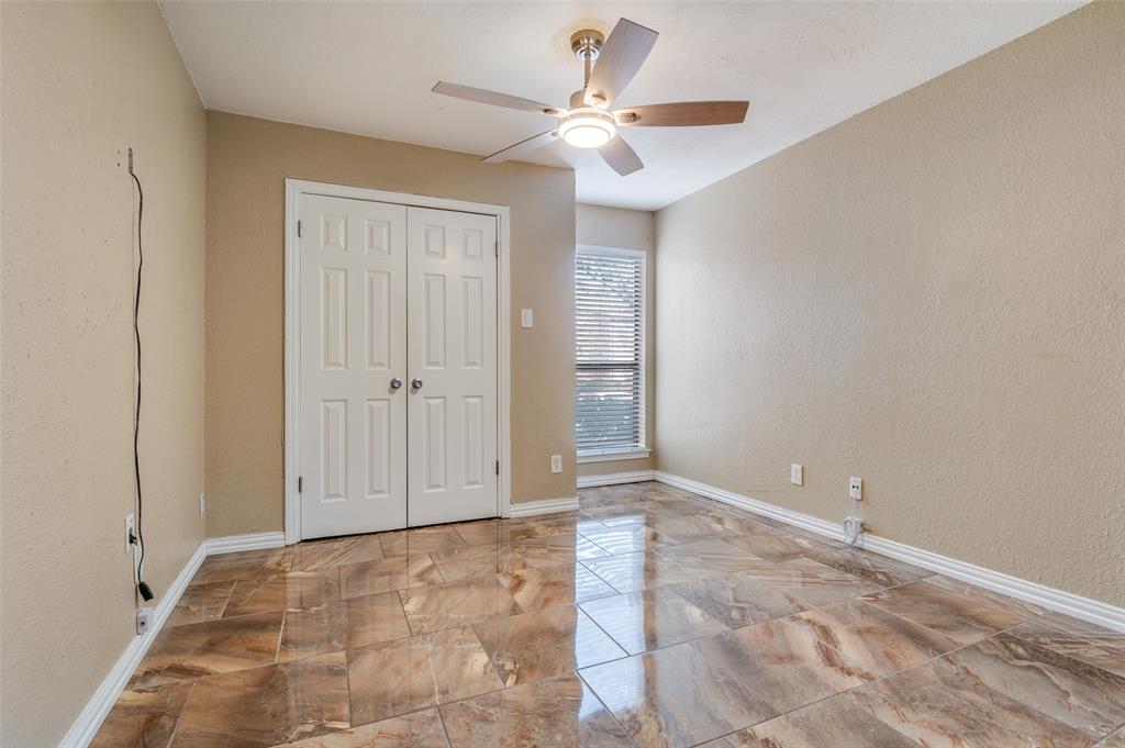 1300 Memory Lane, Unit 5214 Arlington, TX 76011 - Photo 15 of 30 the second bedroom has plenty of space to use as a guest room, office, or flex space!