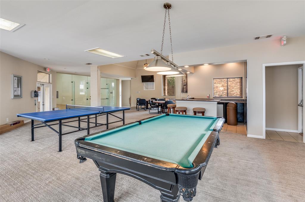 1300 Memory Lane, Unit 5214 Arlington, TX 76011 - Photo 22 of 30 Recreation room with billiards and ping pong table. This is where the handball, basketball court and other amenities are as well.