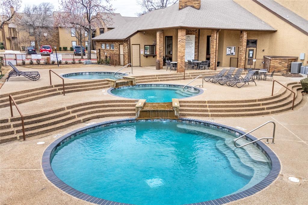 1300 Memory Lane, Unit 5214 Arlington, TX 76011 - Photo 26 of 30 Relaxing pool / spa featuring a patio and located by the community center.