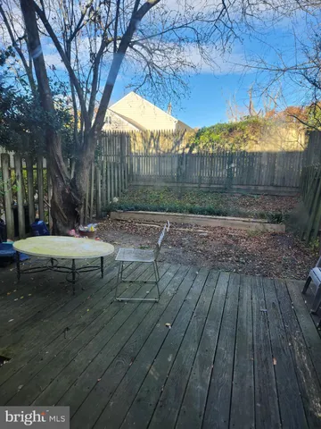 a view of backyard with wooden floor