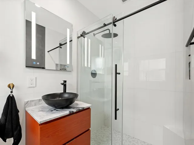 a kitchen with a sink a counter and a sink