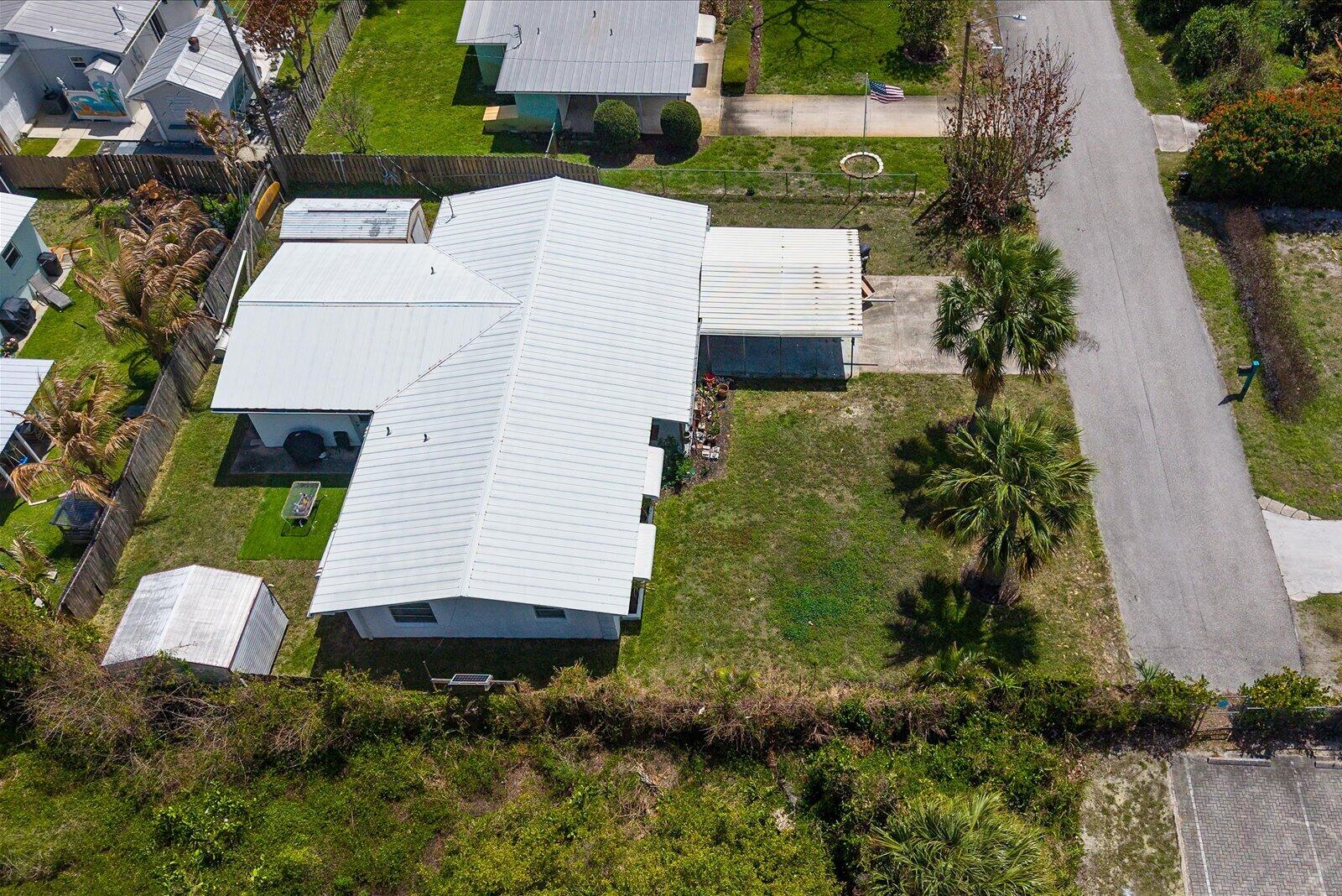 3141 Northeast Spruce Ridge Avenue Jensen Beach, FL 34957 - Photo 35 of 35 35-spruce drone-6