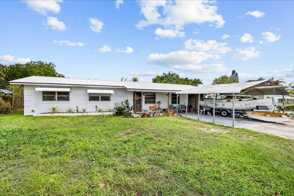 $400,000 | 3141 Northeast Spruce Ridge Avenue, Jensen Beach, FL 34957