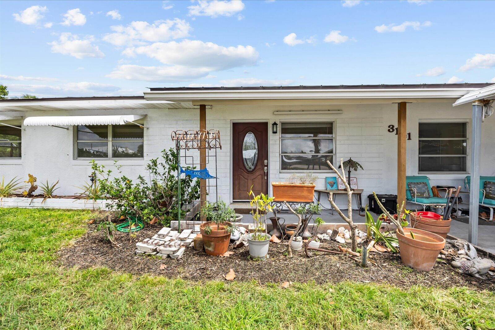 3141 Northeast Spruce Ridge Avenue Jensen Beach, FL 34957 - Photo 6 of 35 05-spruce in more-2