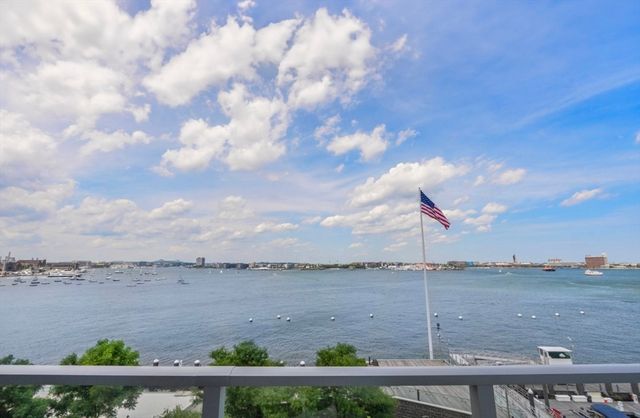 a view of a lake and mountain in the back