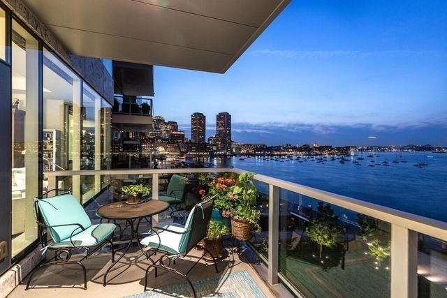 a view of a chairs and table in patio
