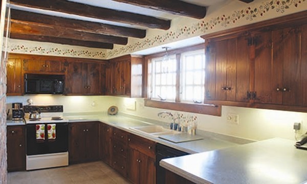 30 Mill Lane Road Brimfield, MA 01010 - Photo 6 of 12 a kitchen with stainless steel appliances wooden cabinets a sink and a stove