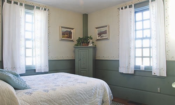 30 Mill Lane Road Brimfield, MA 01010 - Photo 8 of 12 a bedroom with a bed and a window