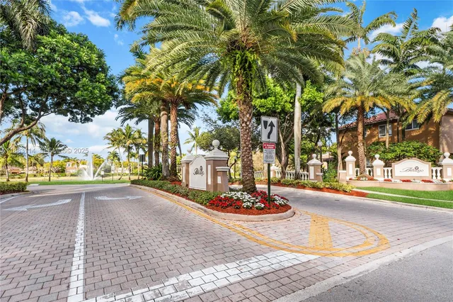 a view of a street with a building in the background