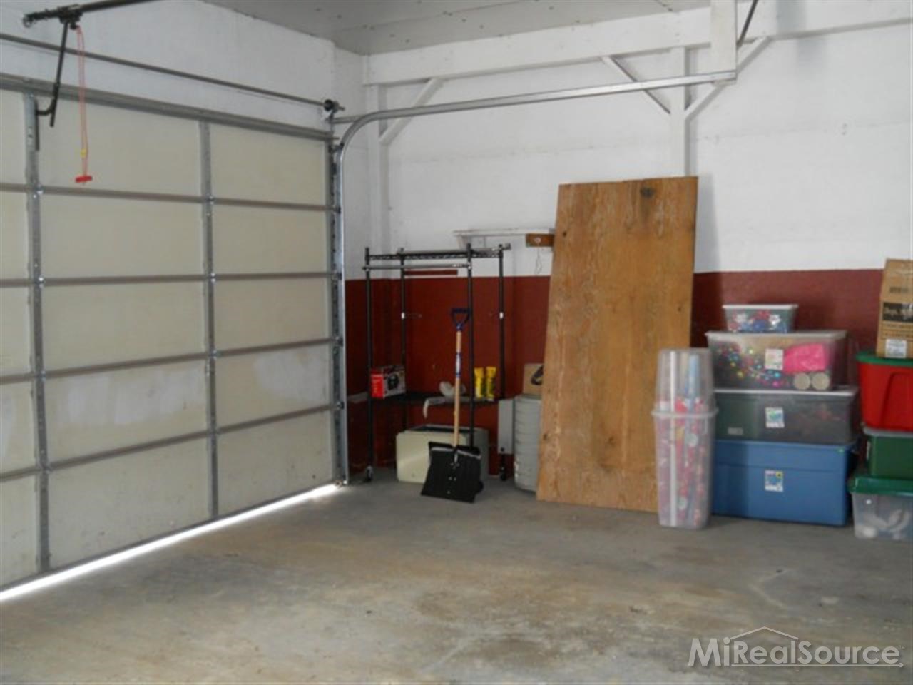 13850 Burt Road Capac, MI 48014 - Photo 20 of 23 This is another view inside the pole barn.