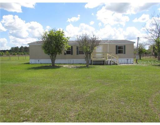 7618 Redwing Road Groveland, FL 34736 - Photo 1 of 1 Exterior Front