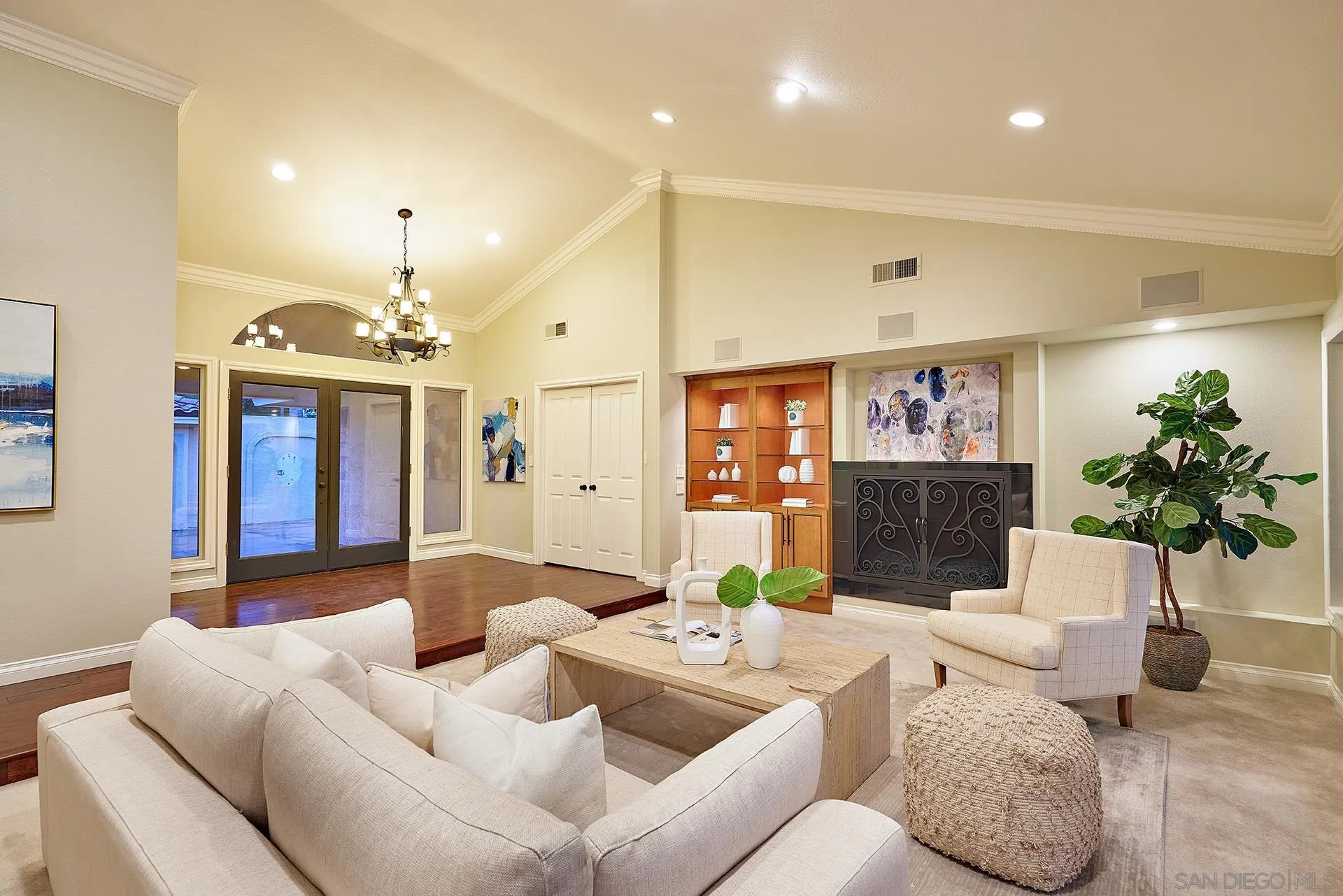 2027 Alga Road Carlsbad, CA 92009 - Photo 13 of 72 a living room with furniture and a chandelier