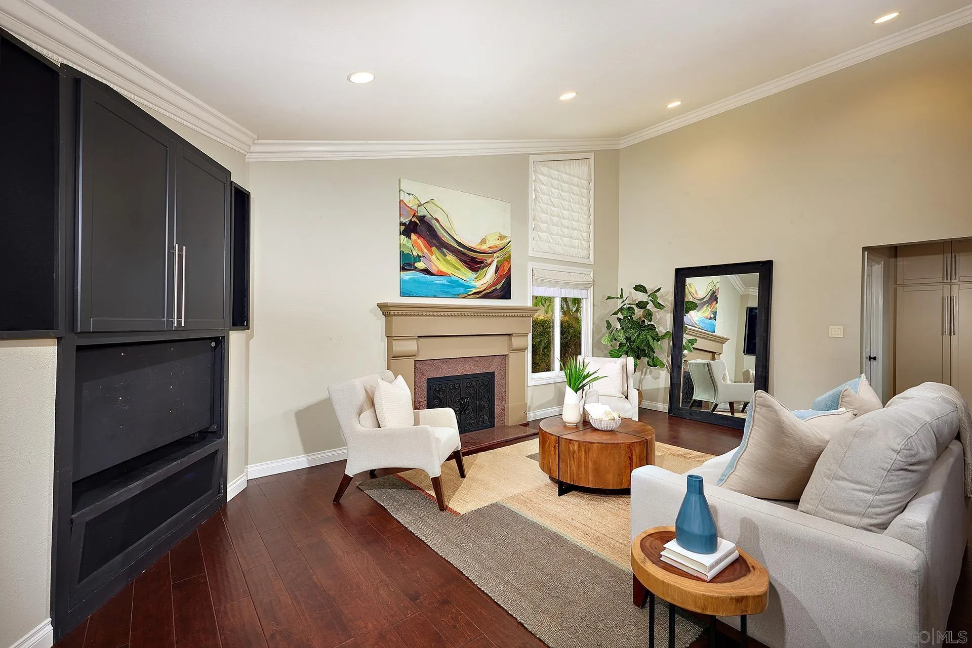 2027 Alga Road Carlsbad, CA 92009 - Photo 27 of 72 a living room with furniture a fireplace and a window