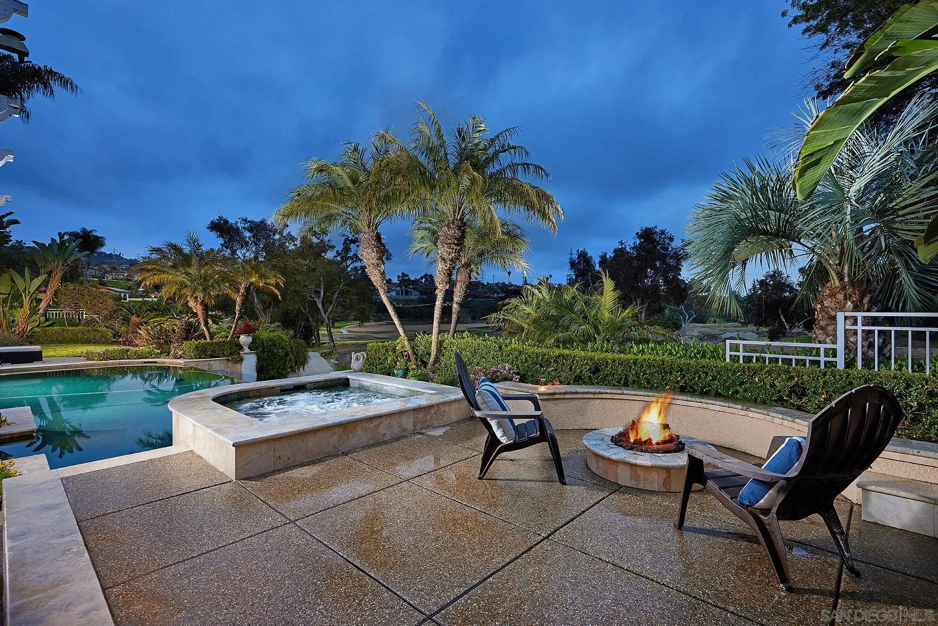 2027 Alga Road Carlsbad, CA 92009 - Photo 3 of 72 a view of a swimming pool and lounge chairs in the patio