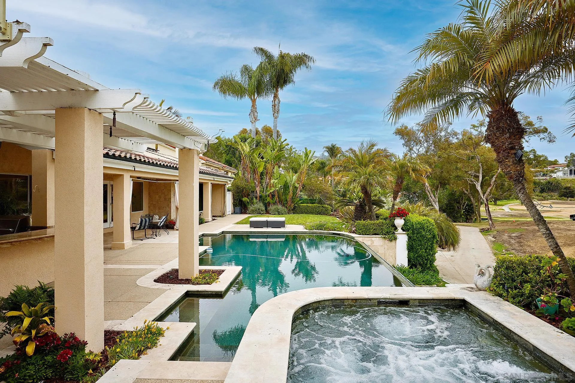 2027 Alga Road Carlsbad, CA 92009 - Photo 45 of 72 a view of a swimming pool with a patio