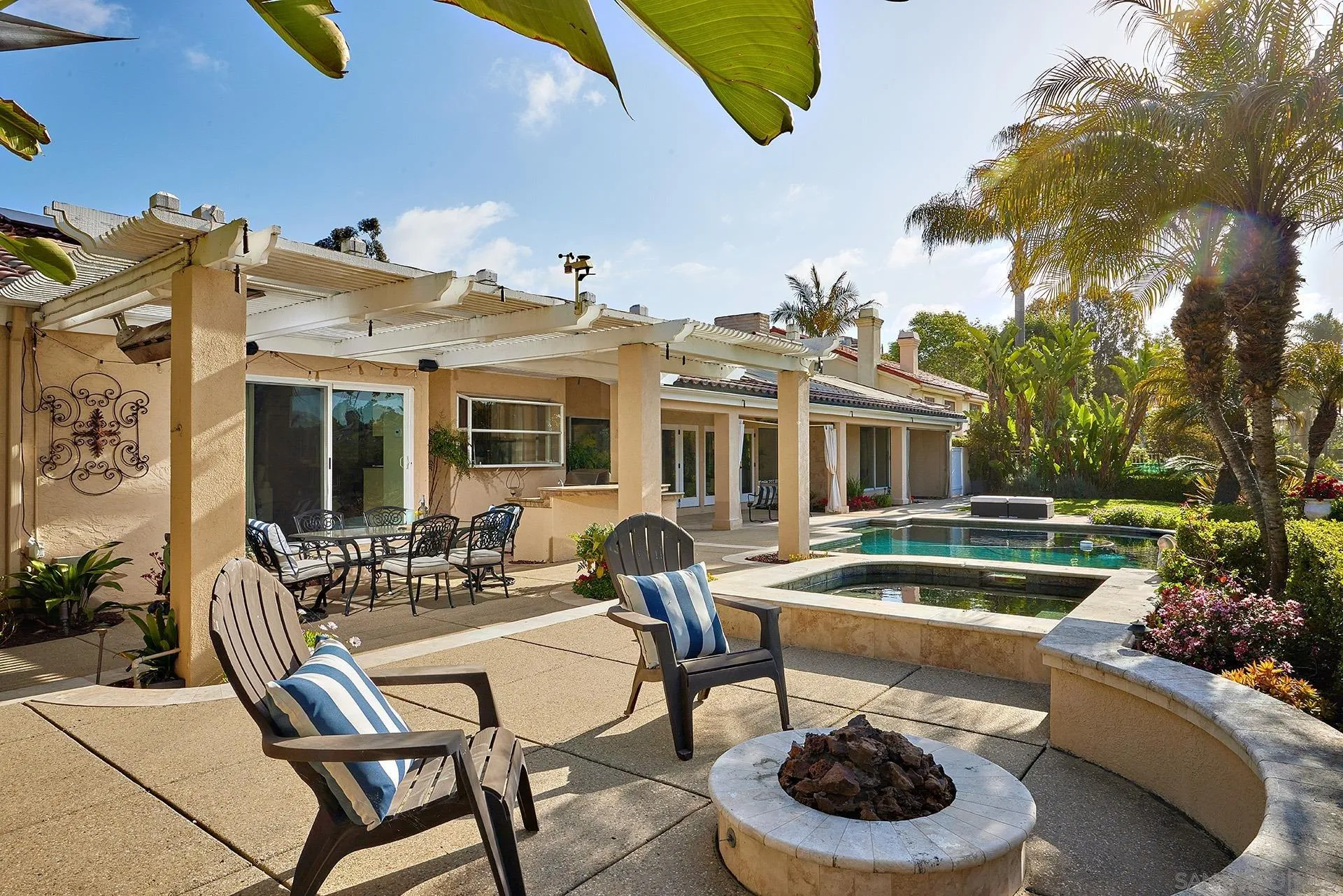 2027 Alga Road Carlsbad, CA 92009 - Photo 61 of 72 a view of house with swimming pool and furniture