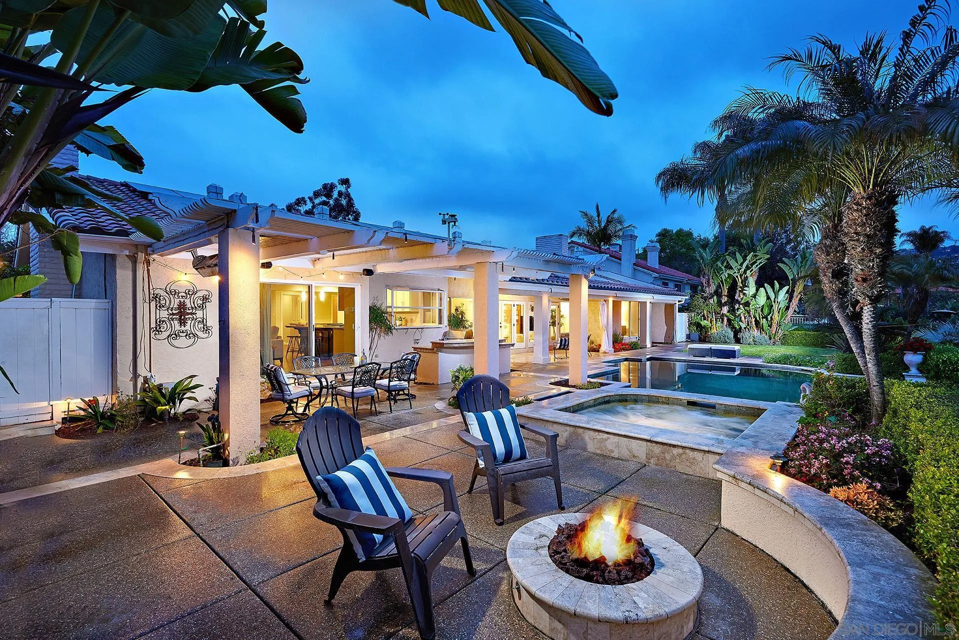 2027 Alga Road Carlsbad, CA 92009 - Photo 7 of 72 a view of a patio with swimming pool table and chairs