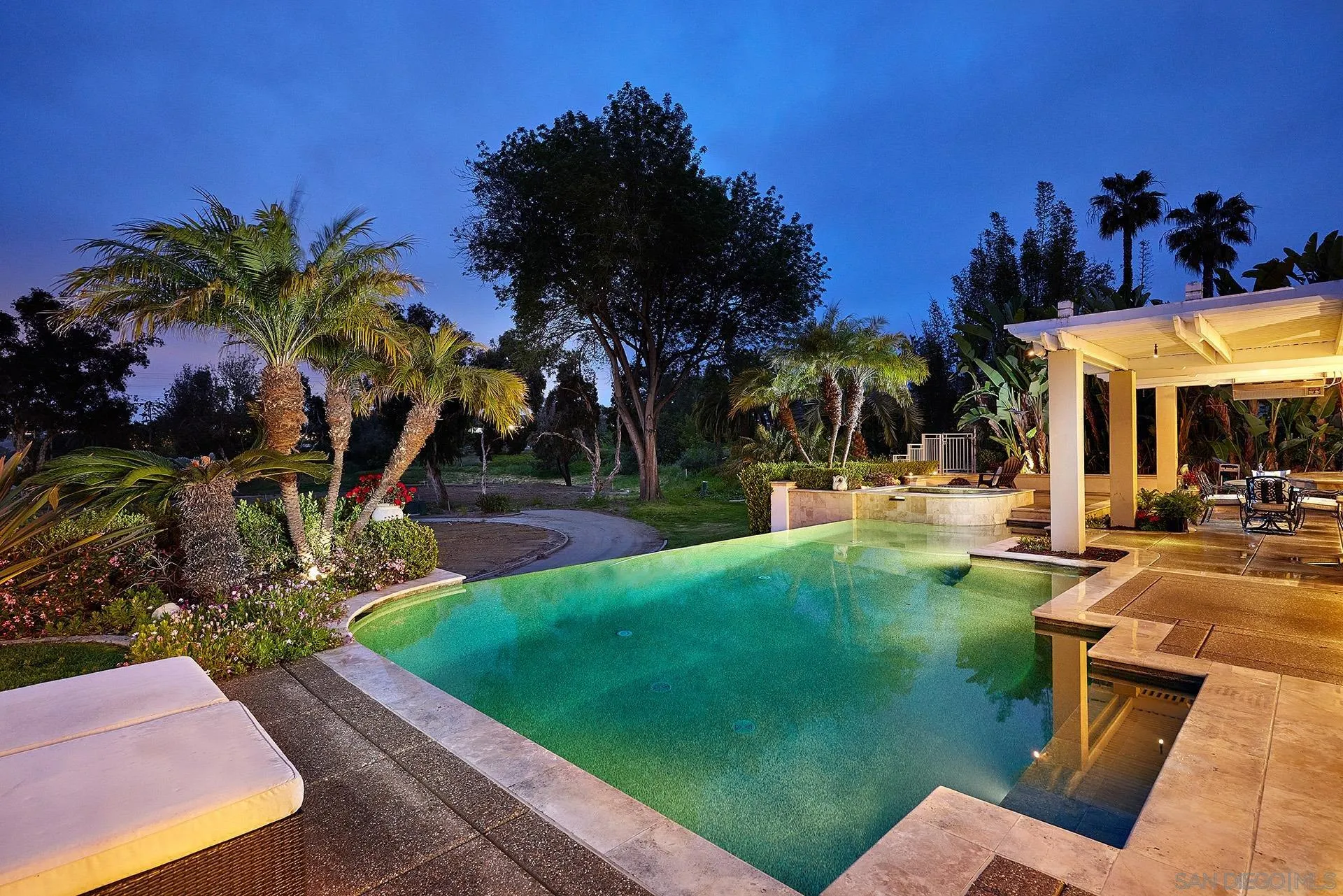 2027 Alga Road Carlsbad, CA 92009 - Photo 10 of 72 a view of a swimming pool with a patio