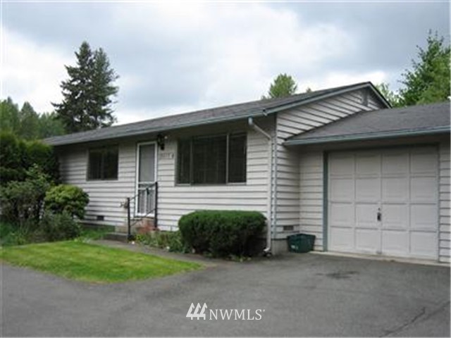 20617 Filbert Drive Bothell, WA 98012 - Photo 1 of 1 a view of a house with a yard