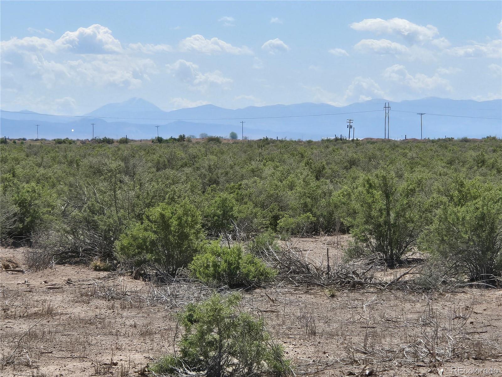 40 Acres Tbd Mosca, CO 81146 - Photo 5 of 13 a view of a big yard with green space and fog