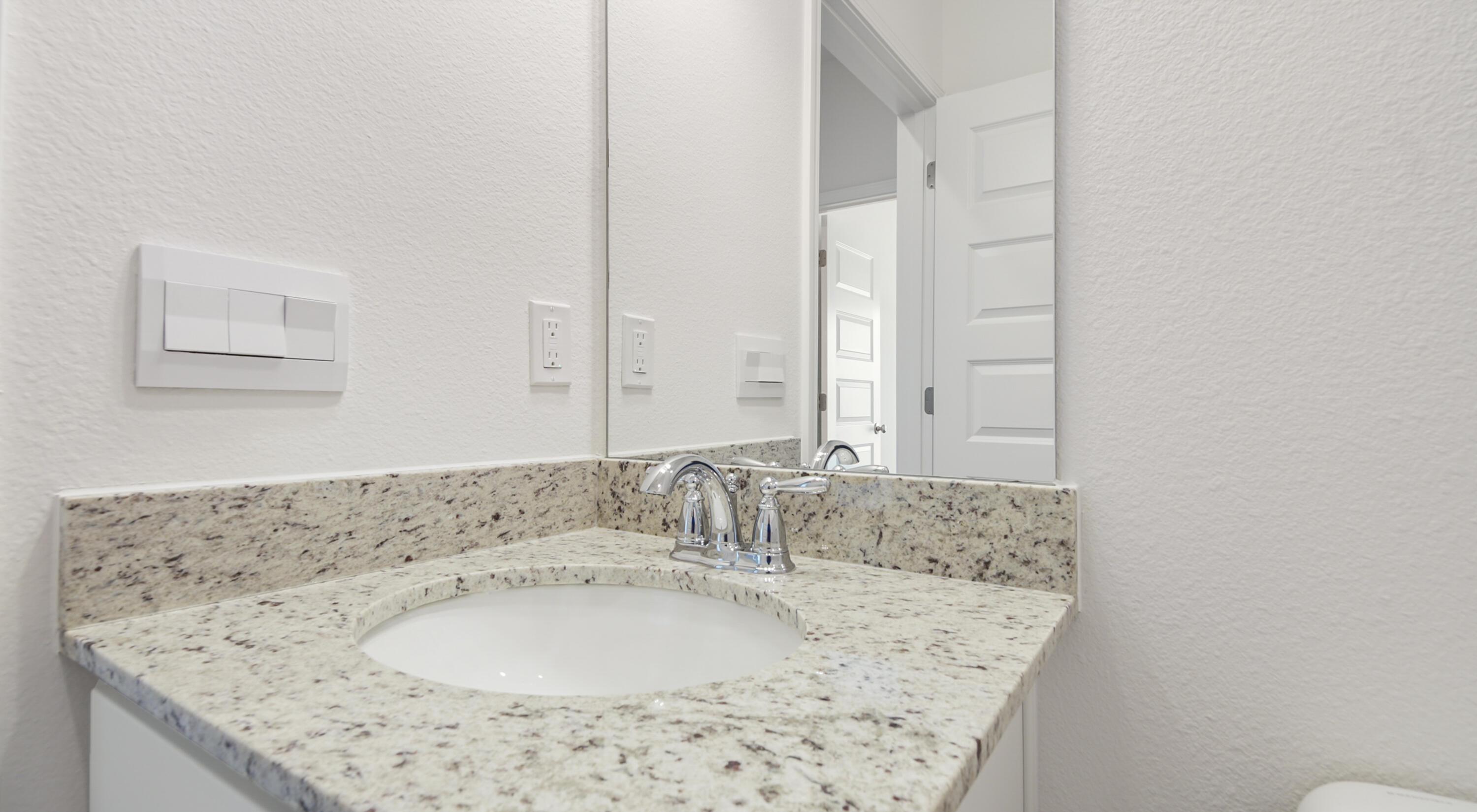 494 Arrowwood Boulevard Freeport, FL 32439 - Photo 28 of 32 a bathroom with a granite countertop sink and a bathtub
