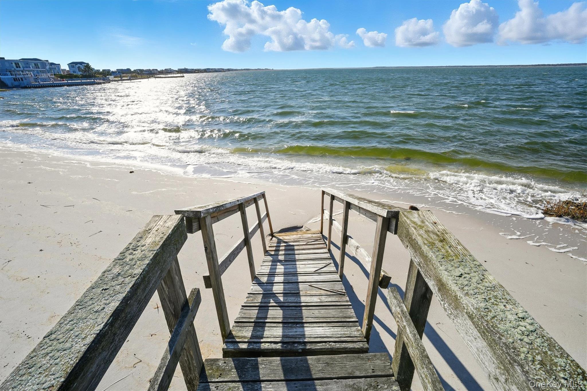 556 Dune Road Westhampton, NY 11978 - Photo 20 of 20 a view of a balcony with an ocean