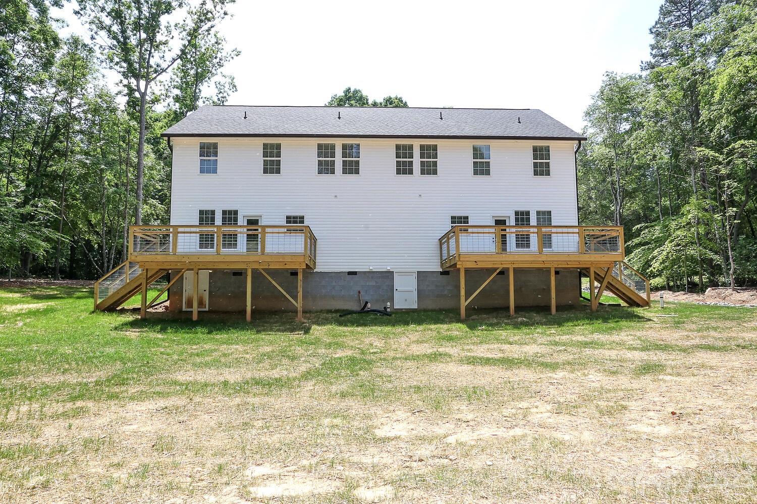 8710 Island Point Road Sherrills Ford, NC 28673 - Photo 48 of 48 a backyard of a house with table and chairs