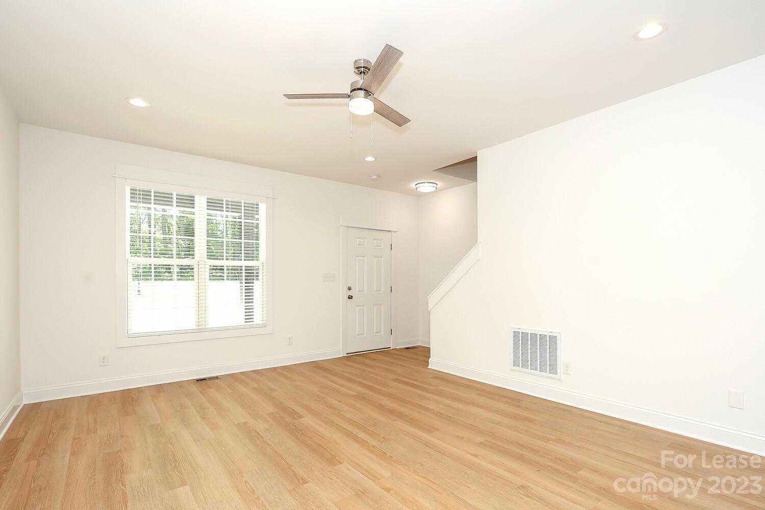 8710 Island Point Road Sherrills Ford, NC 28673 - Photo 8 of 48 a view of an empty room with a window