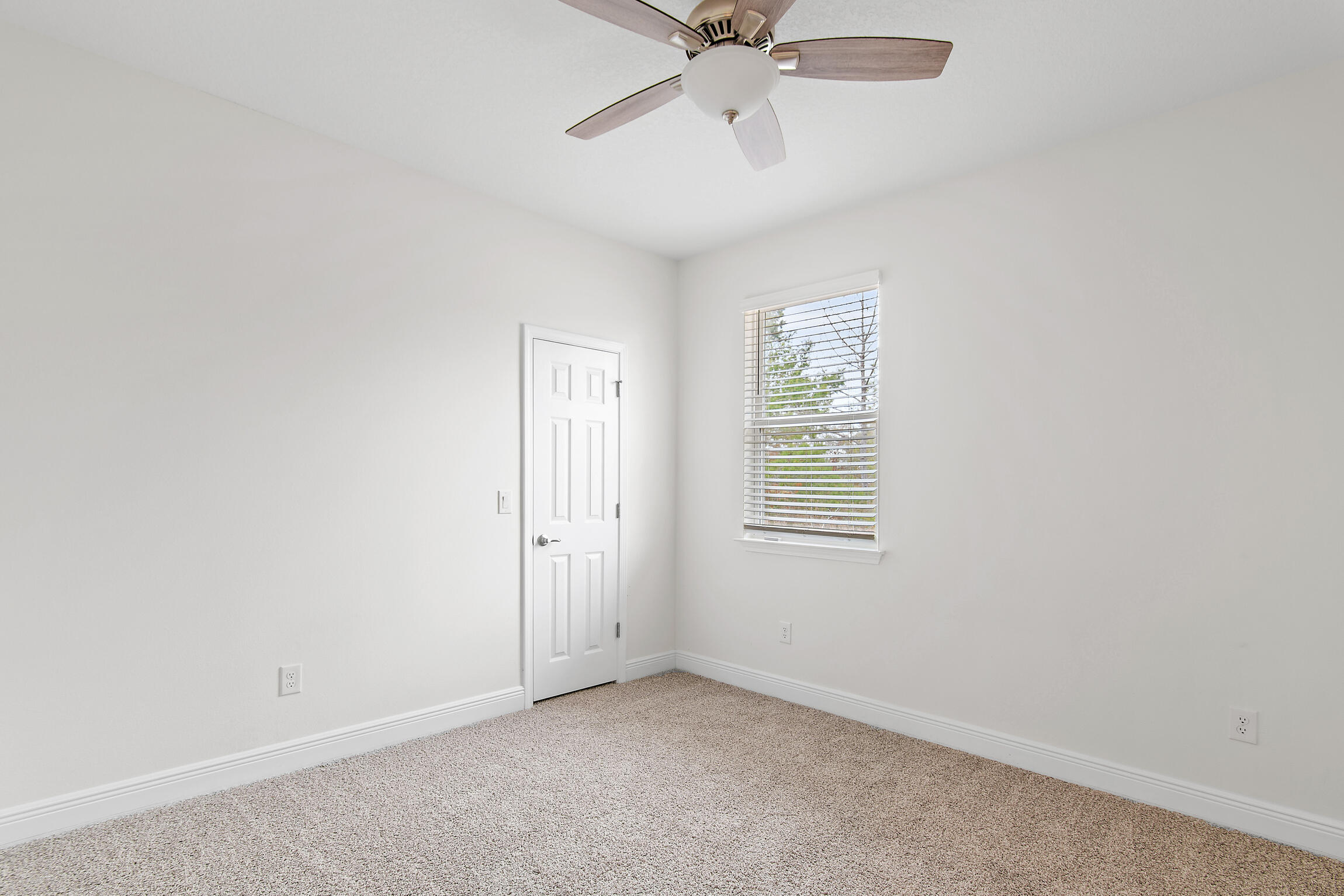 430 Fairway Crossing Freeport, FL 32439 - Photo 24 of 57 an empty room with a window and a fan