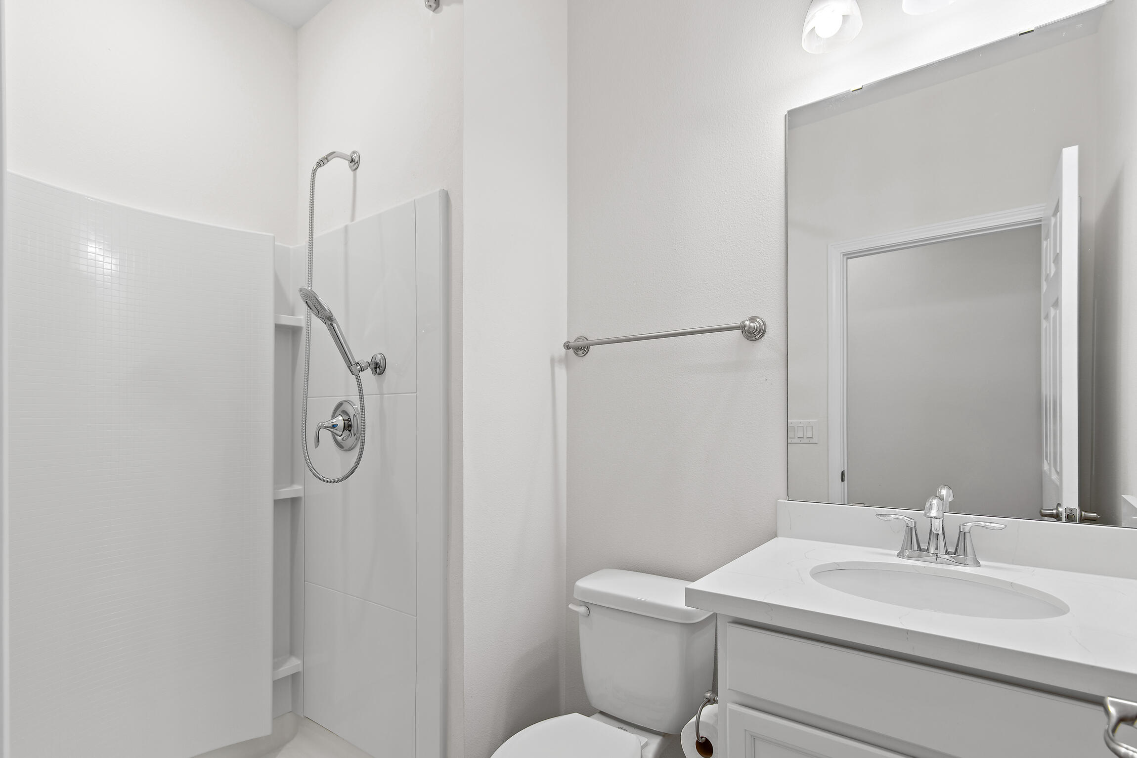 430 Fairway Crossing Freeport, FL 32439 - Photo 26 of 57 a bathroom with a sink vanity mirror and toilet