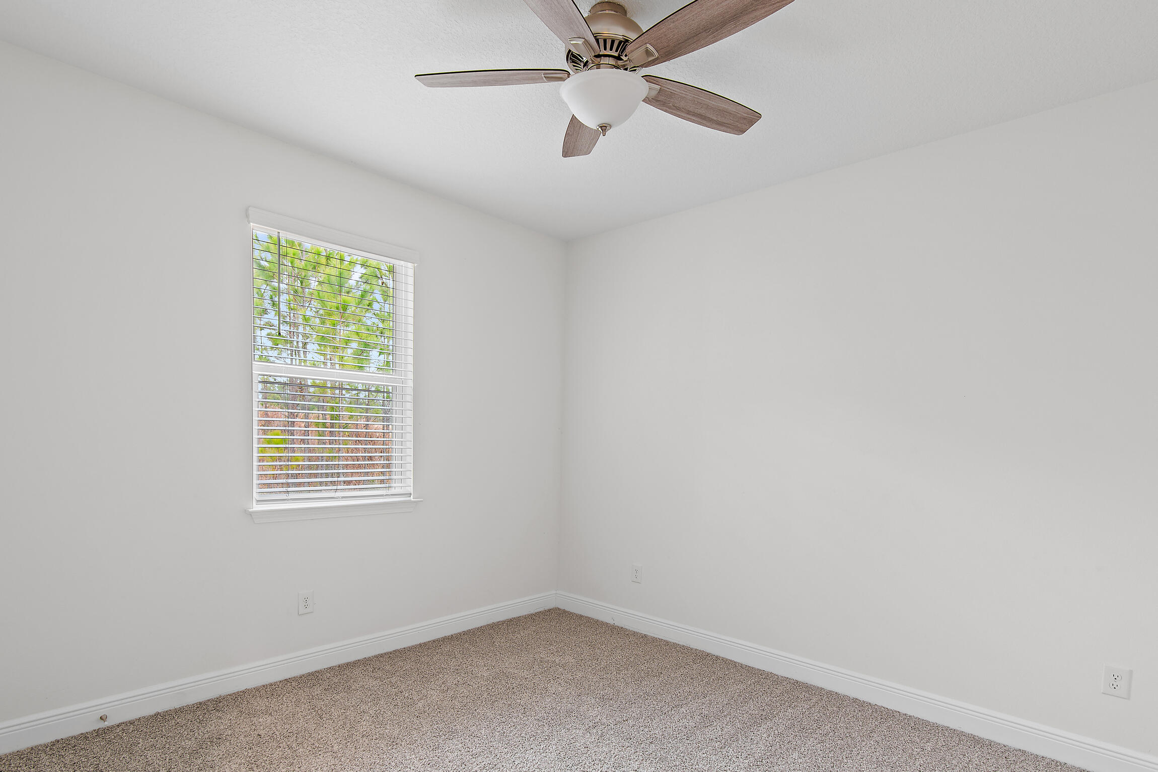 430 Fairway Crossing Freeport, FL 32439 - Photo 33 of 57 an empty room with a window and a fan