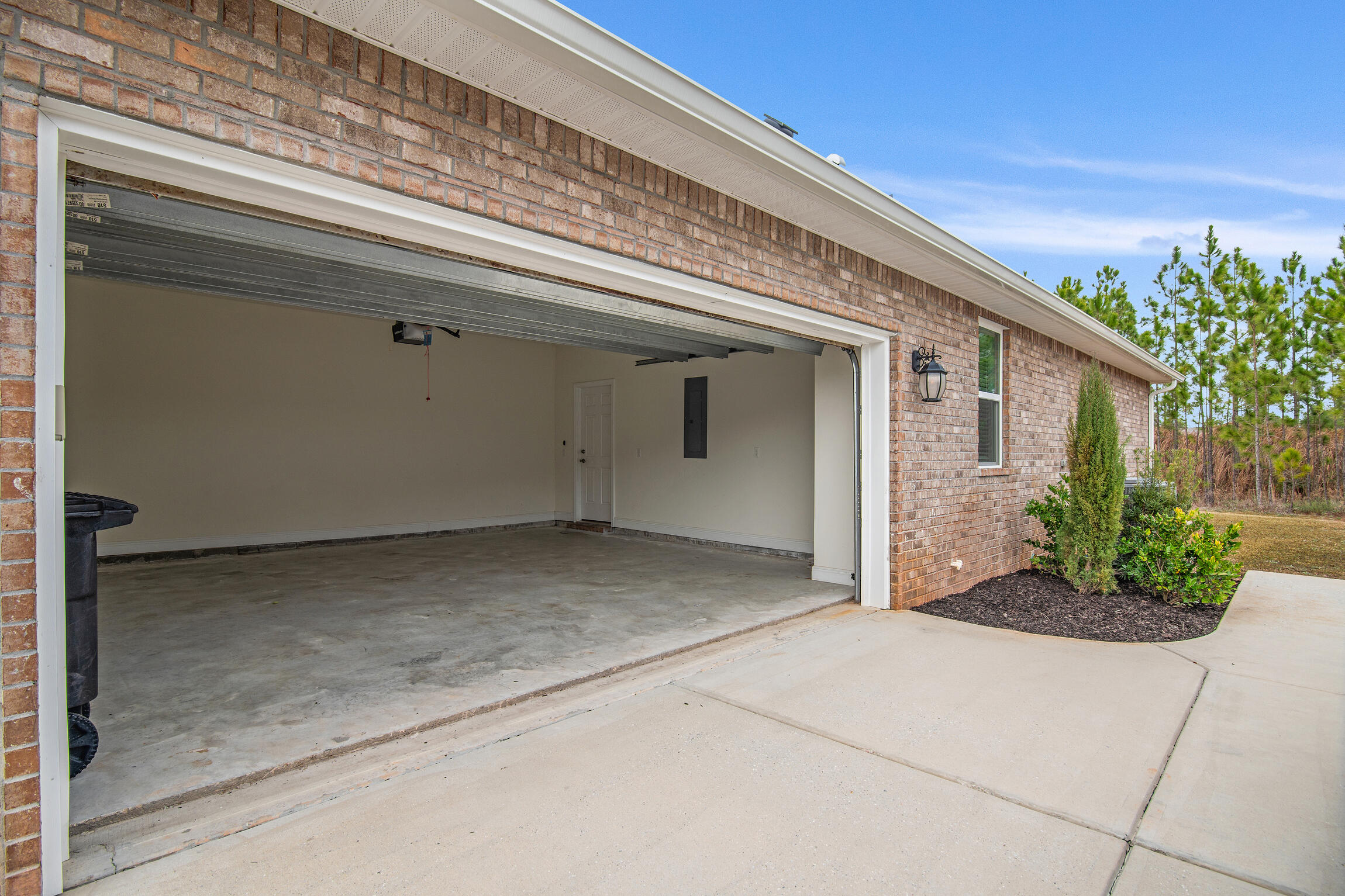 430 Fairway Crossing Freeport, FL 32439 - Photo 43 of 57 a view of a house with potted plants