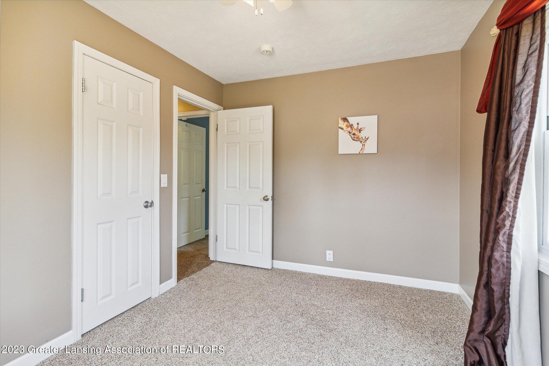 7866 East Greenfield Road Lansing, MI 48917 - Photo 33 of 50 Bedroom 2