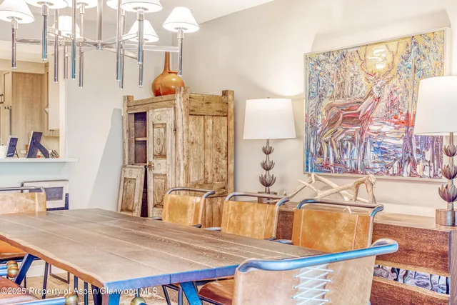 a bathroom with a sink a mirror and a shower