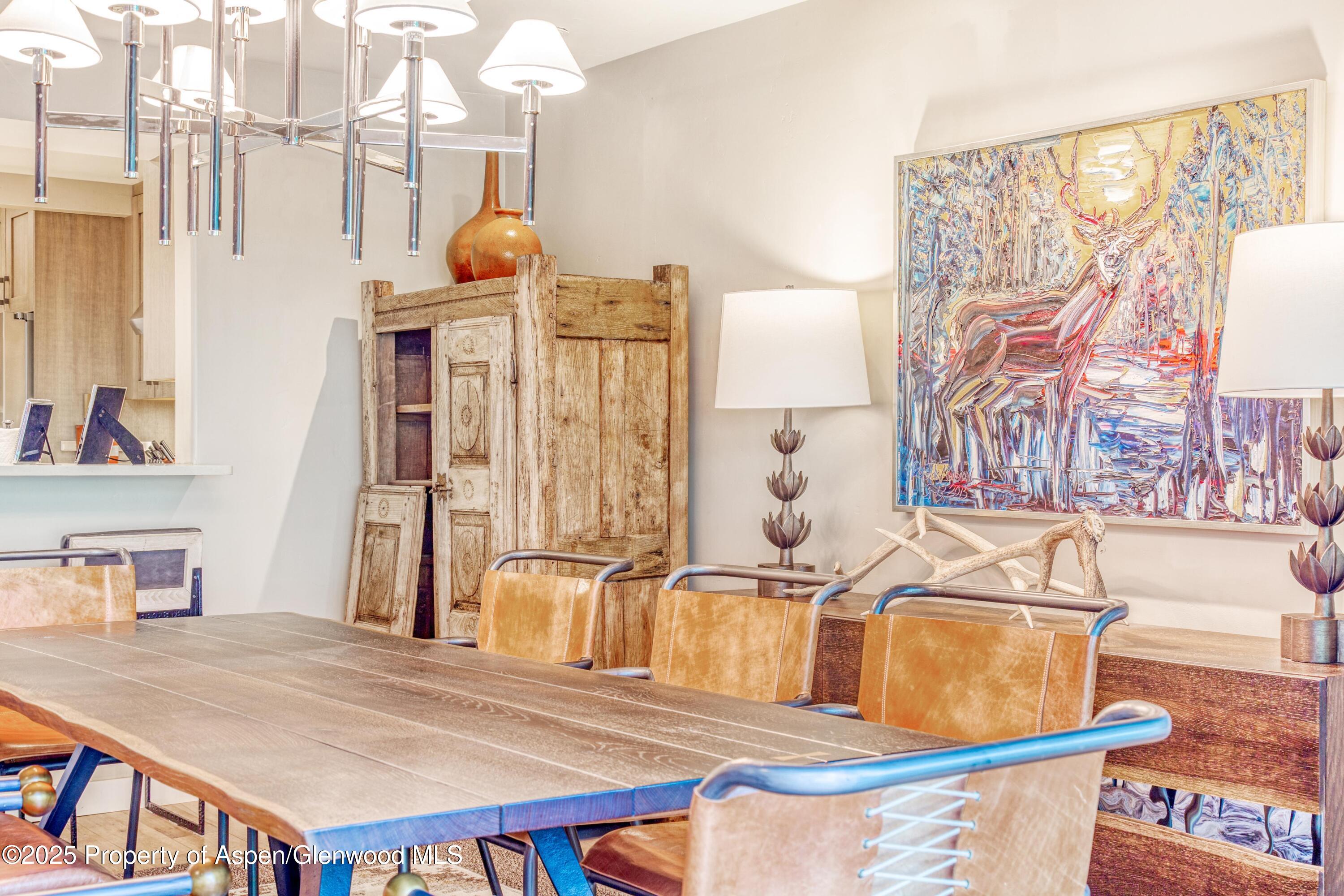 52 Harleston Green, Unit 38 Snowmass Village, CO 81615 - Photo 36 of 40 a bathroom with a sink a mirror and a shower