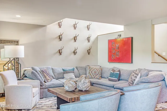 a living room with furniture and a couch