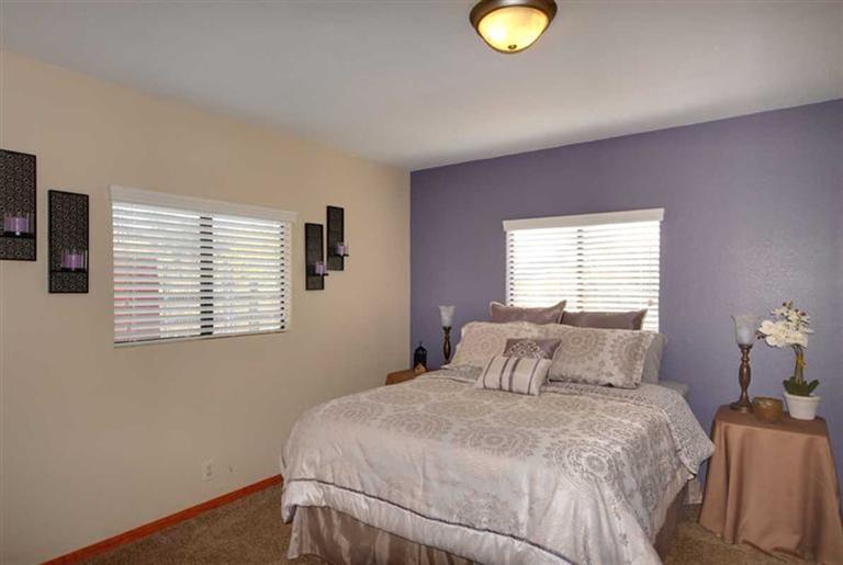 198 Riverside Road Oak View, CA 93022 - Photo 11 of 24 a bedroom with a bed and window