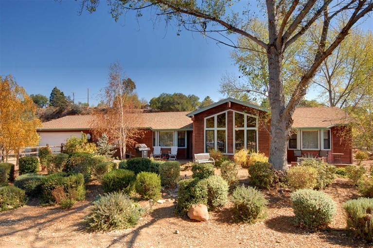 198 Riverside Road Oak View, CA 93022 - Photo 2 of 24 a front view of a house with a yard
