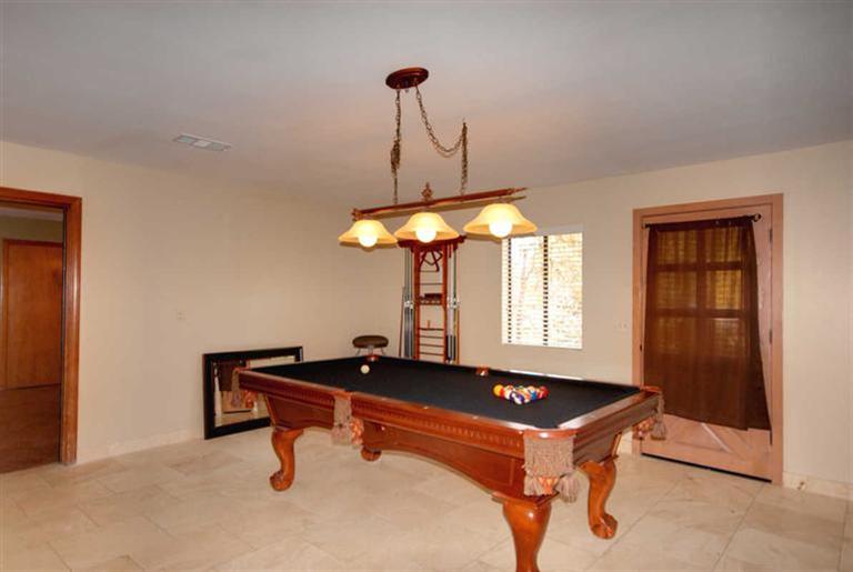 198 Riverside Road Oak View, CA 93022 - Photo 9 of 24 a room with pool table and windows